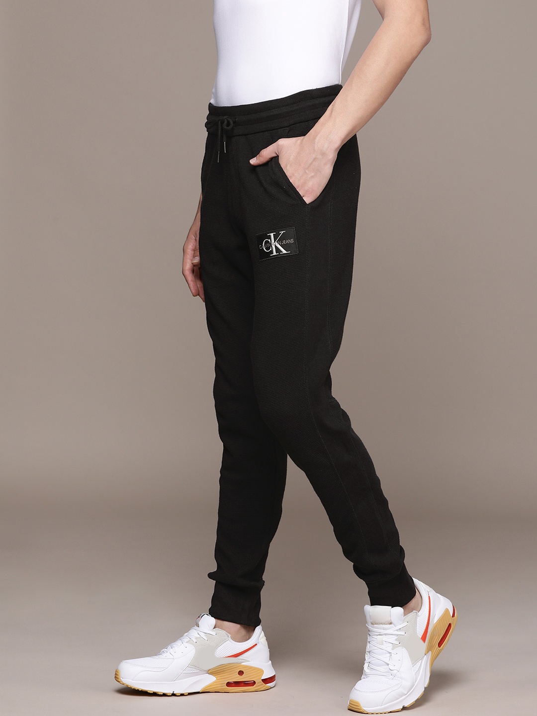 

J318589BEH-CK Black CALVIN KLEIN MEN'S SOLID BLACK TRACK PANTS