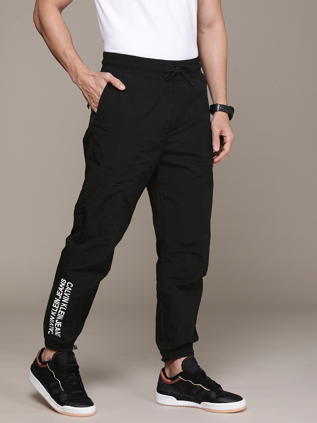 

Calvin Klein Jeans Men Black Joggers with Brand Logo Print Detail