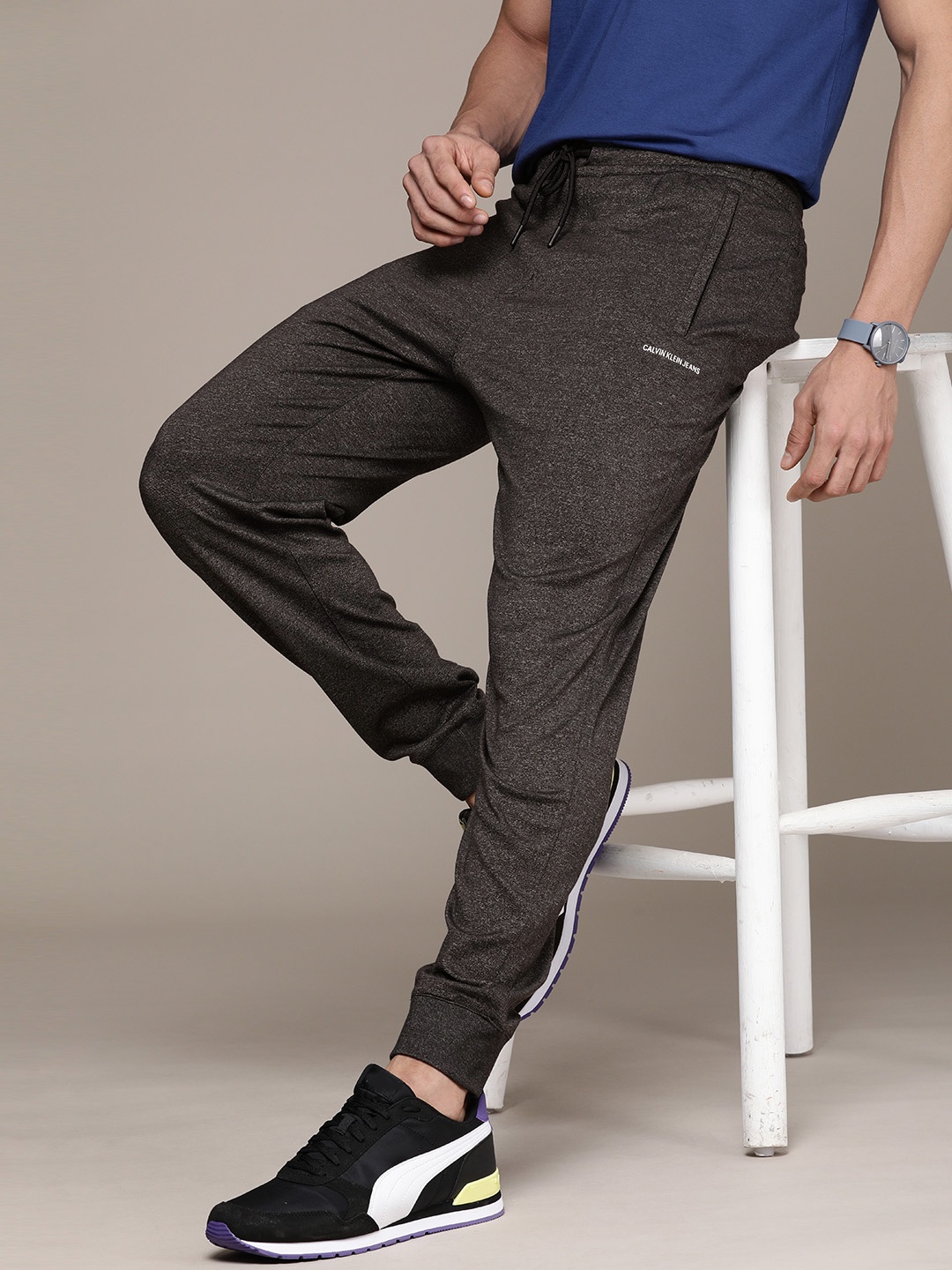 

Calvin Klein Jeans Men Black Brand logo Printed Slim Fit Joggers With Side Stripes