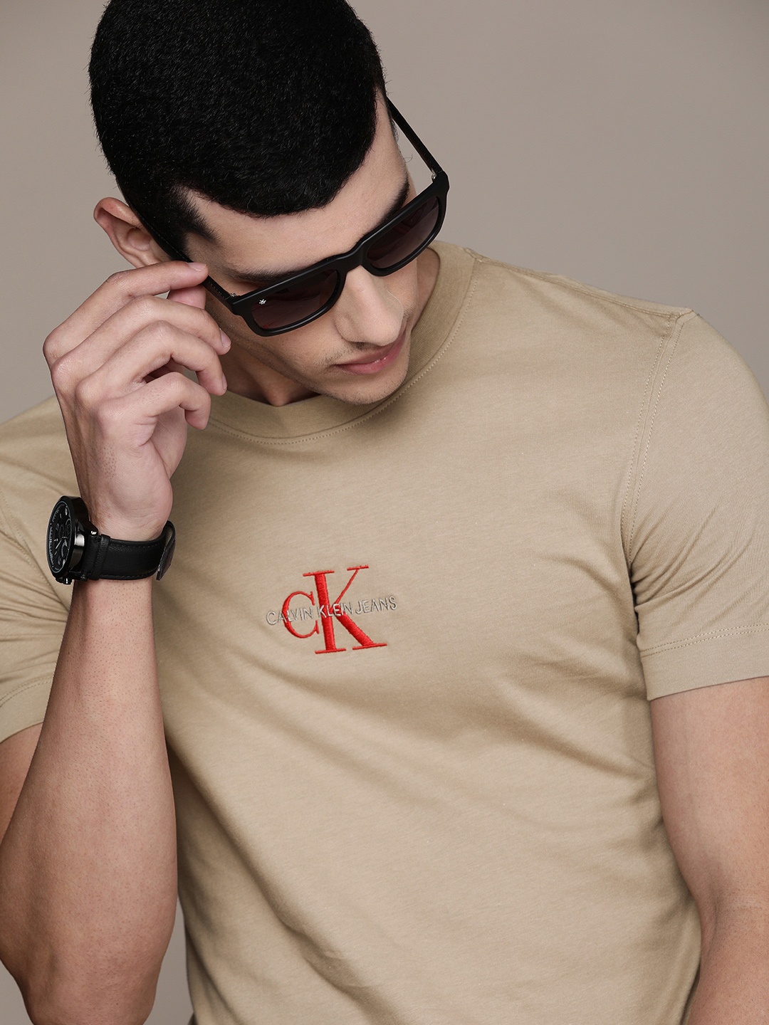 

Calvin Klein Jeans Men Brown Brand Logo Printed Slim Fit T-shirt