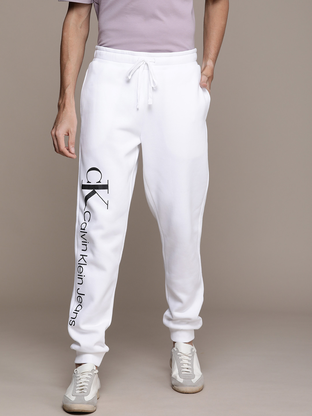 

Calvin Klein Jeans Men White Brand Logo Printed Joggers