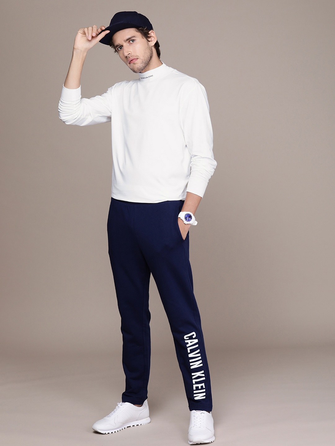

Calvin Klein Jeans Men White Solid High Neck Casual T-shirt