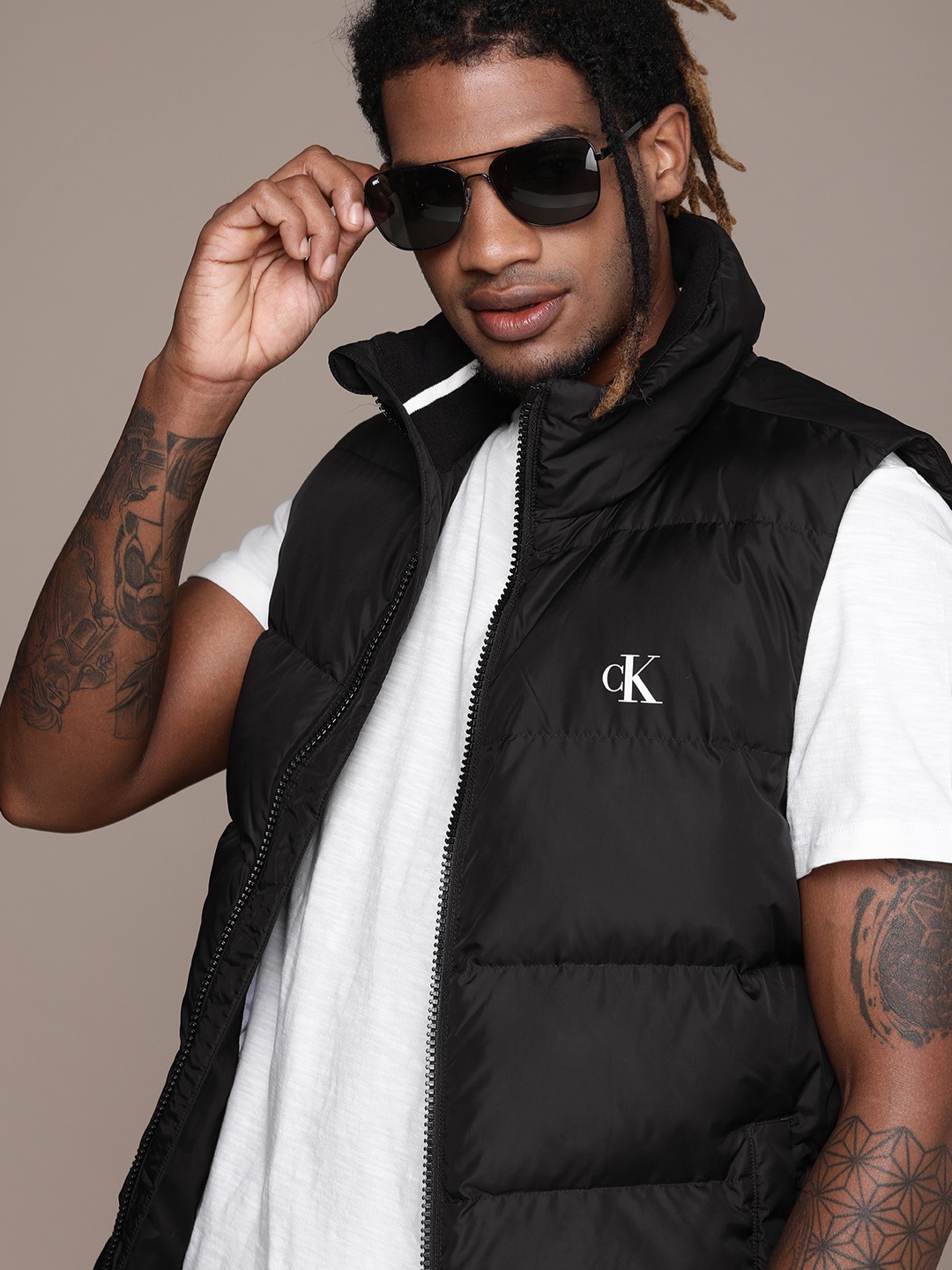 

Calvin Klein Jeans Men Black Solid Sleeveless Stand-Collar Puffer Jacket