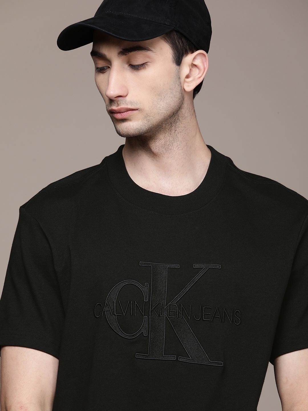 

Calvin Klein Jeans Men Black Printed Pure Cotton T-shirt