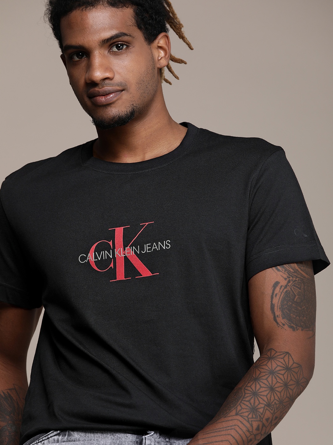 

Calvin Klein Jeans Men Black Logo Printed Regular Fit Casual Pure Cotton T-shirt