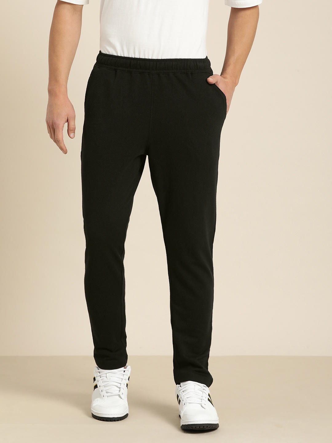

Invictus Indoor Men Blue Solid Mid Rise Elasticated Casual Joggers Track Pants, Black