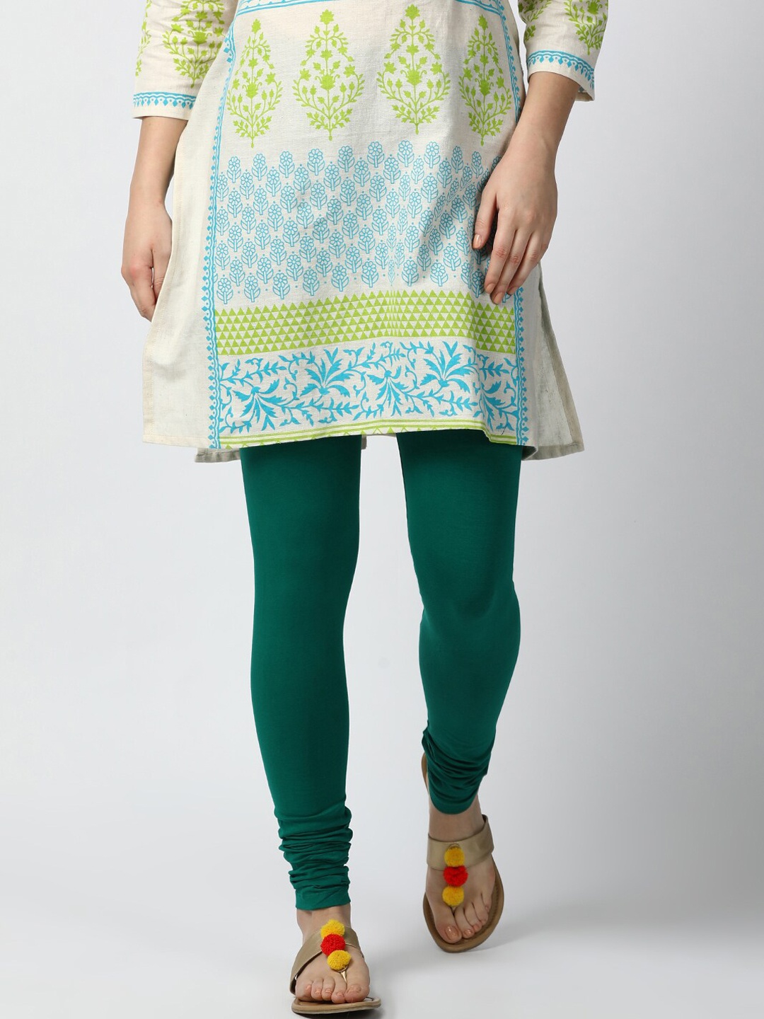 

GOLDSTROMS Women Green Solid Churidar-Length Cotton Leggings