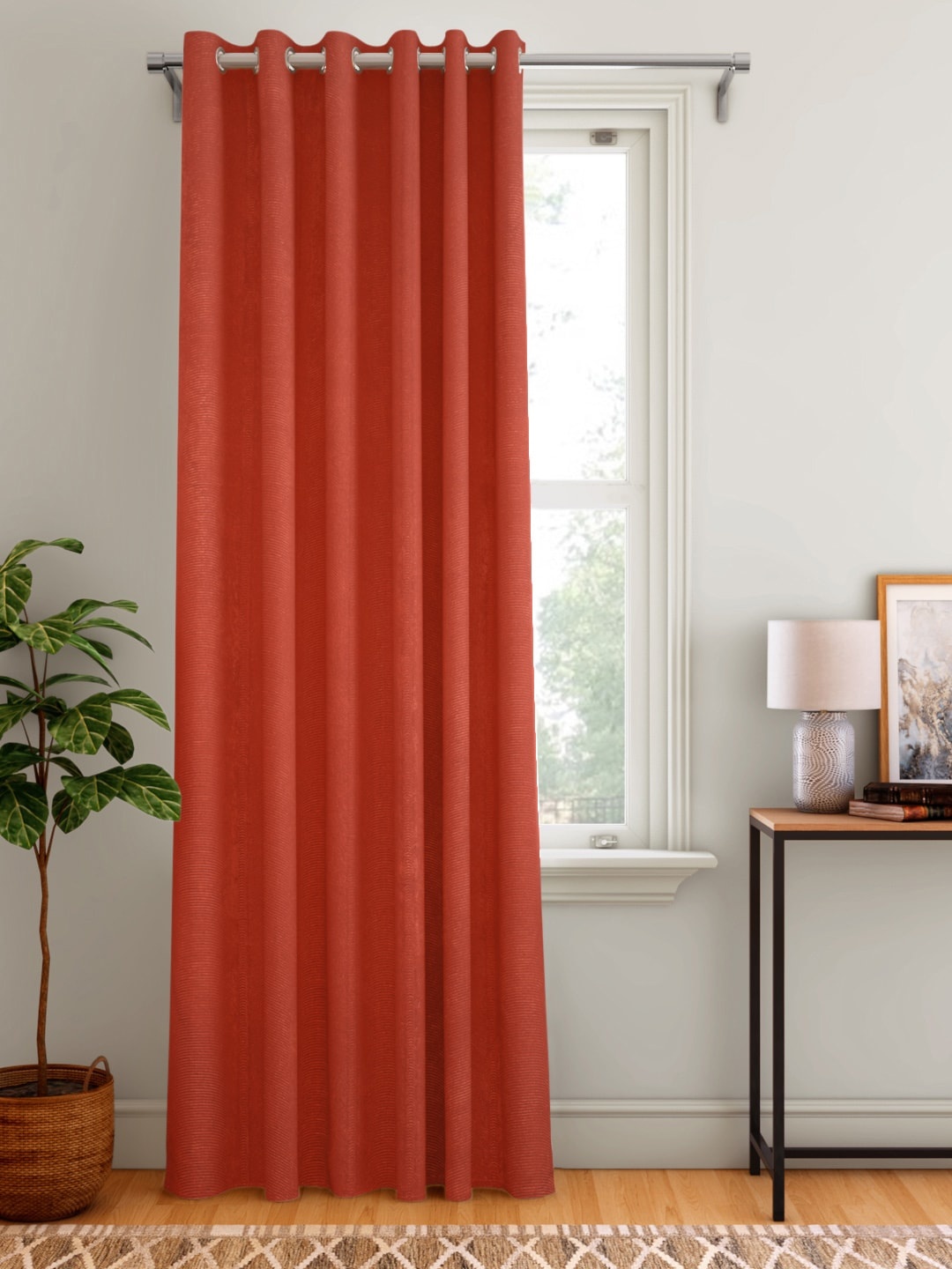 

Aura Rust Red Self Design Door Curtain