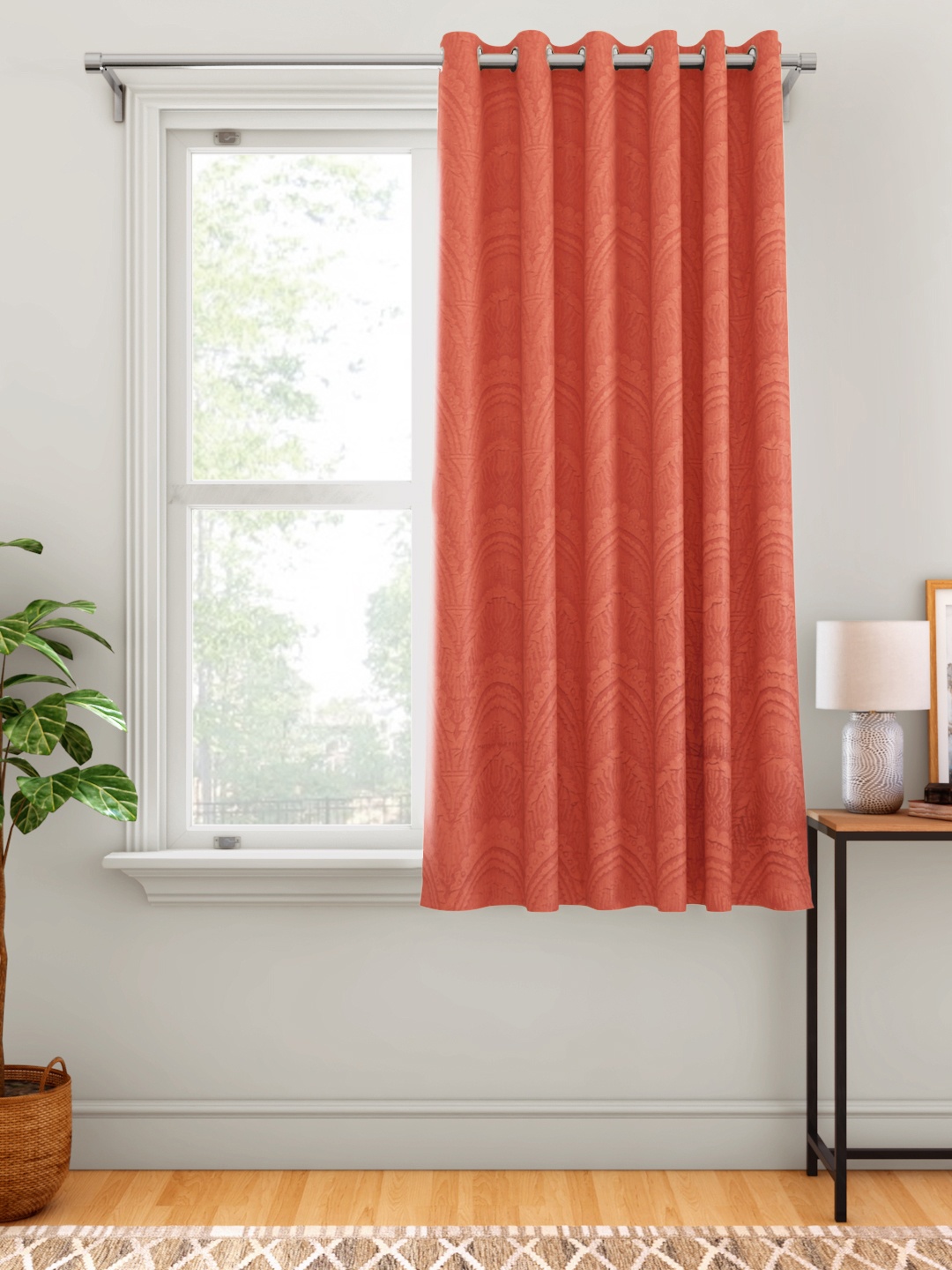 

Aura Rust Orange Self Design Window Curtain