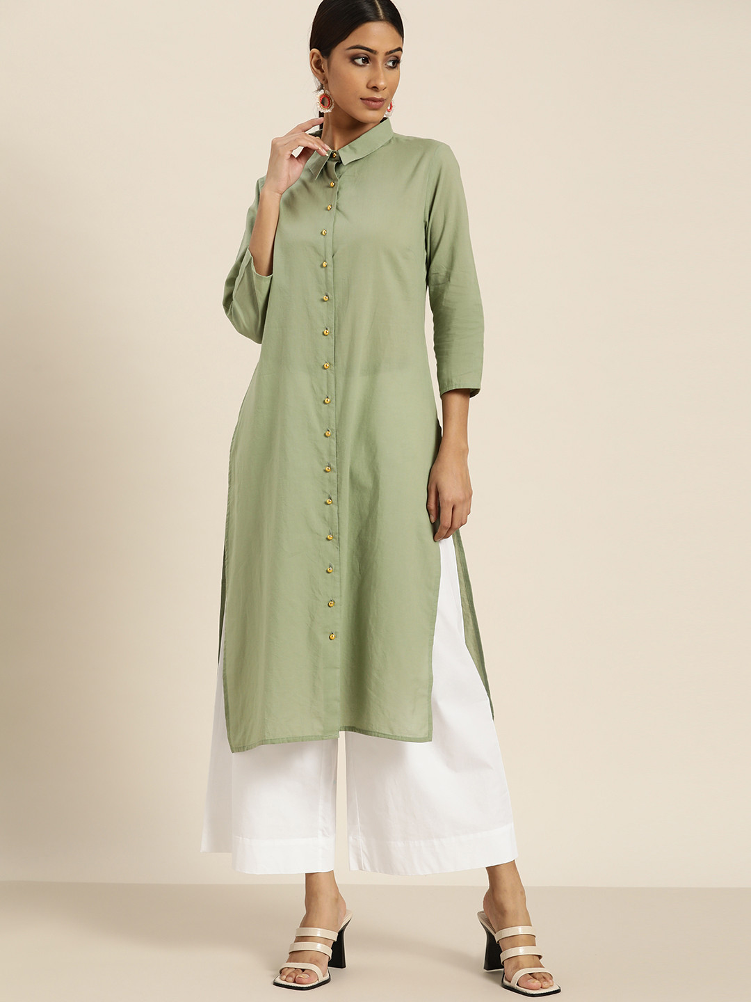 

Moda Rapido Women Green Solid Cotton Straight Kurta