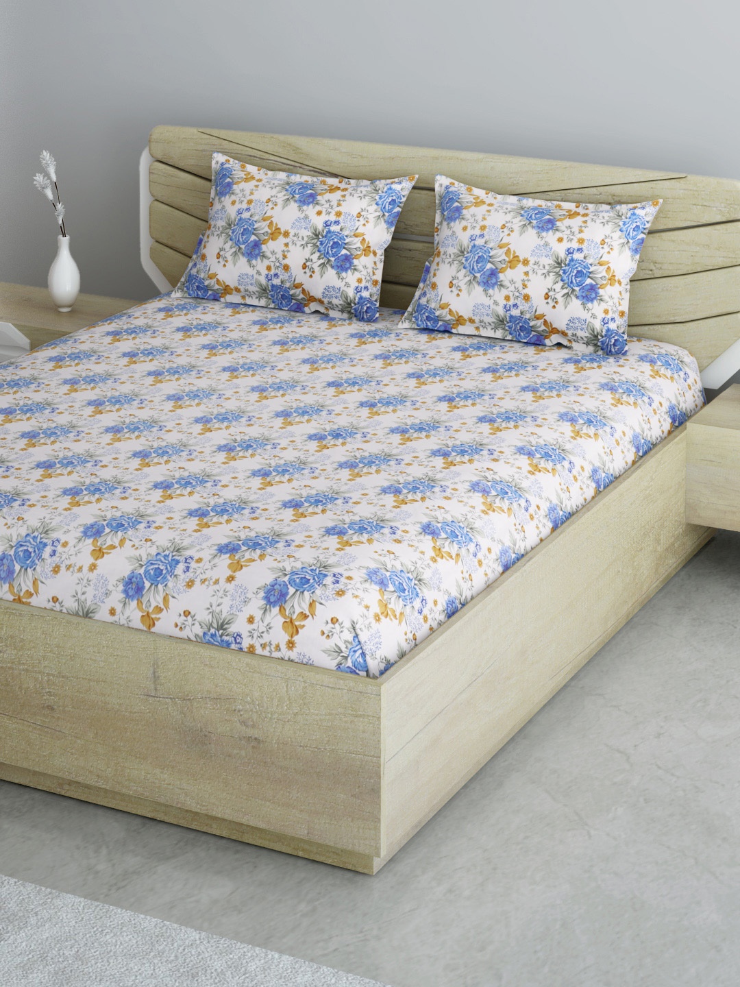 

Aura White & Blue Floral 144 TC 120 GSM Queen Bedsheet with 2 Pillow Covers