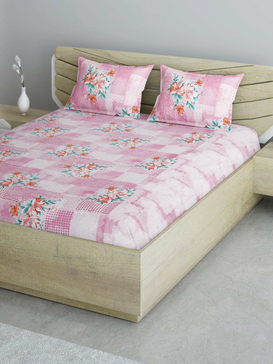 

Aura Pink & White Floral 144 TC 120 GSM Queen Bedsheet with 2 Pillow Covers