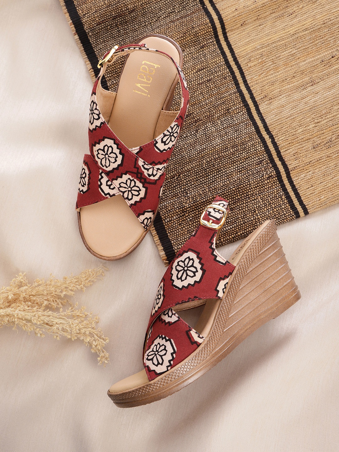 

Taavi Women Maroon & Black Ethnic Printed Criss-Cross Open Toe Wedges
