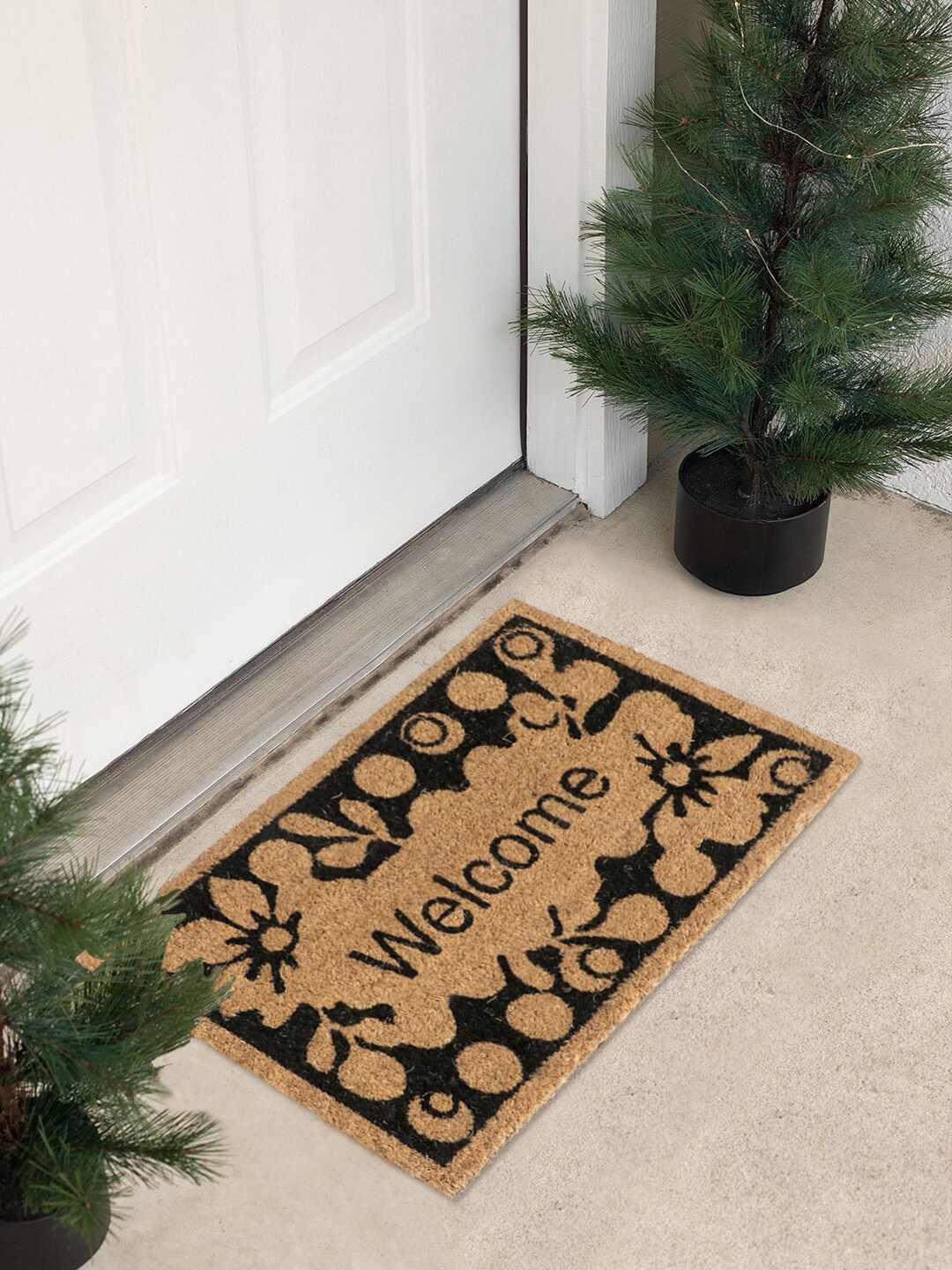 

HomeStorie Brown & Black Printed Anti-Skid Rectangular Doormat