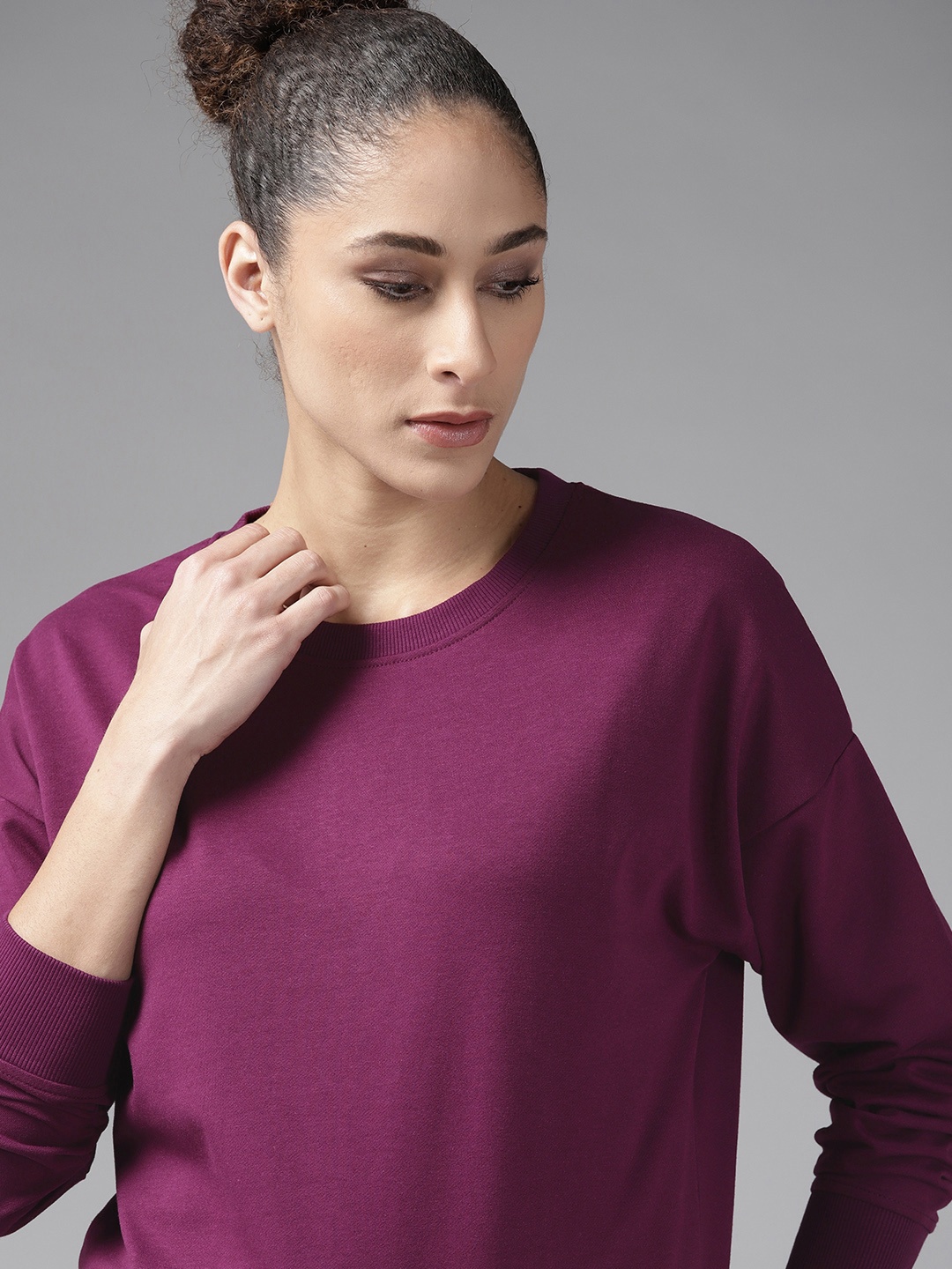 

Roadster Women Purple Drop-Shoulder Sleeves Solid Sweatshirt