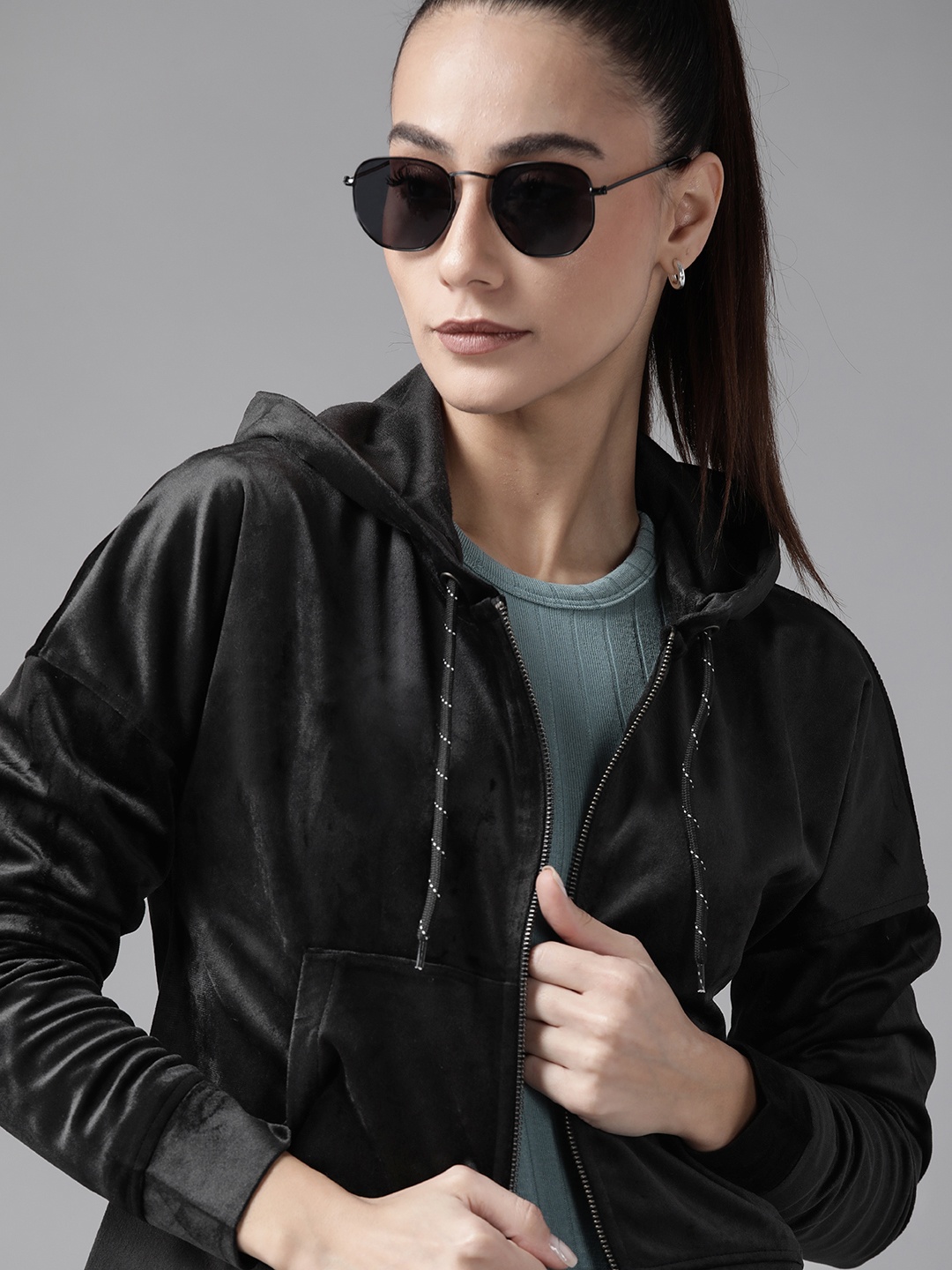

Roadster Women Black Solid Velvet Hooded Sweatshirt