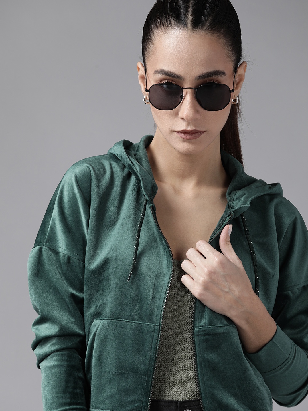 

Roadster Women Green Velvet Finish Solid Hooded Sweatshirt