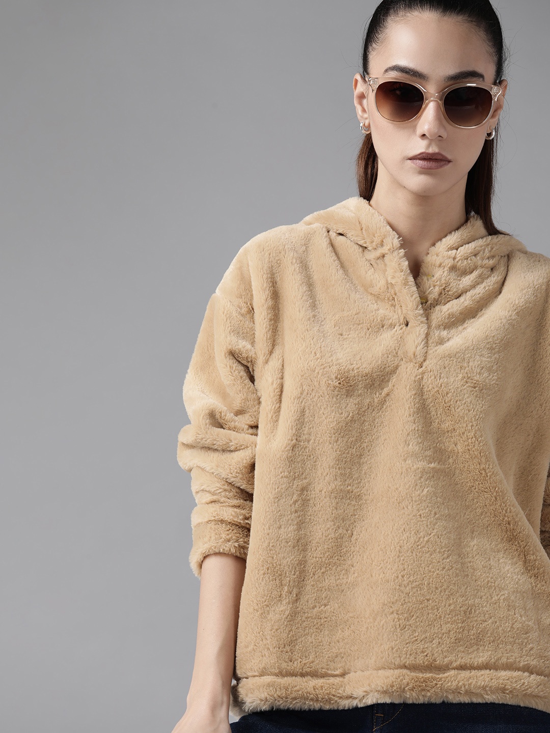 

Roadster Women Beige Solid Faux Fur Hooded Sweatshirt