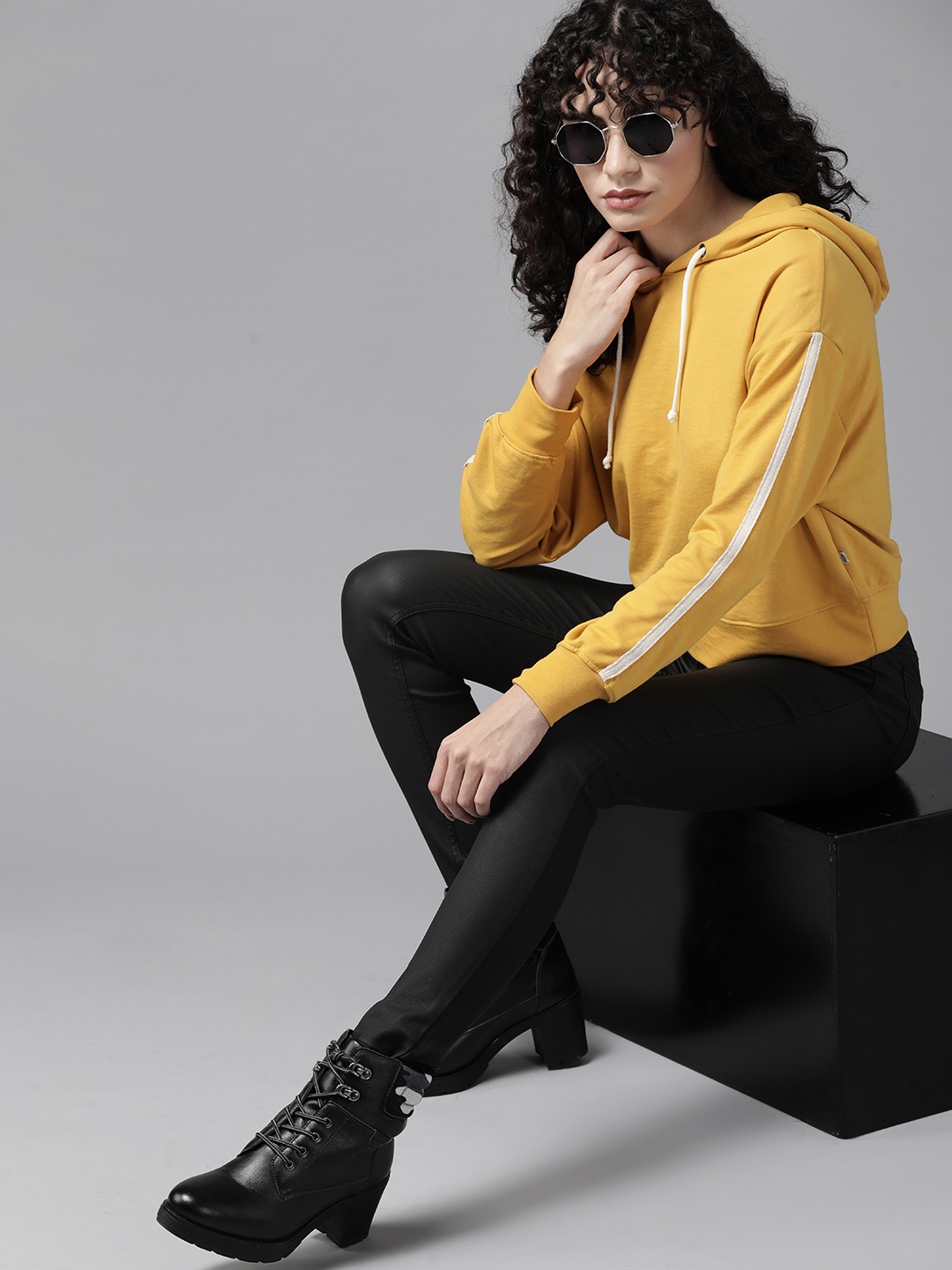 

Roadster Women Yellow Solid Drop Shoulder Hooded Sweatshirt