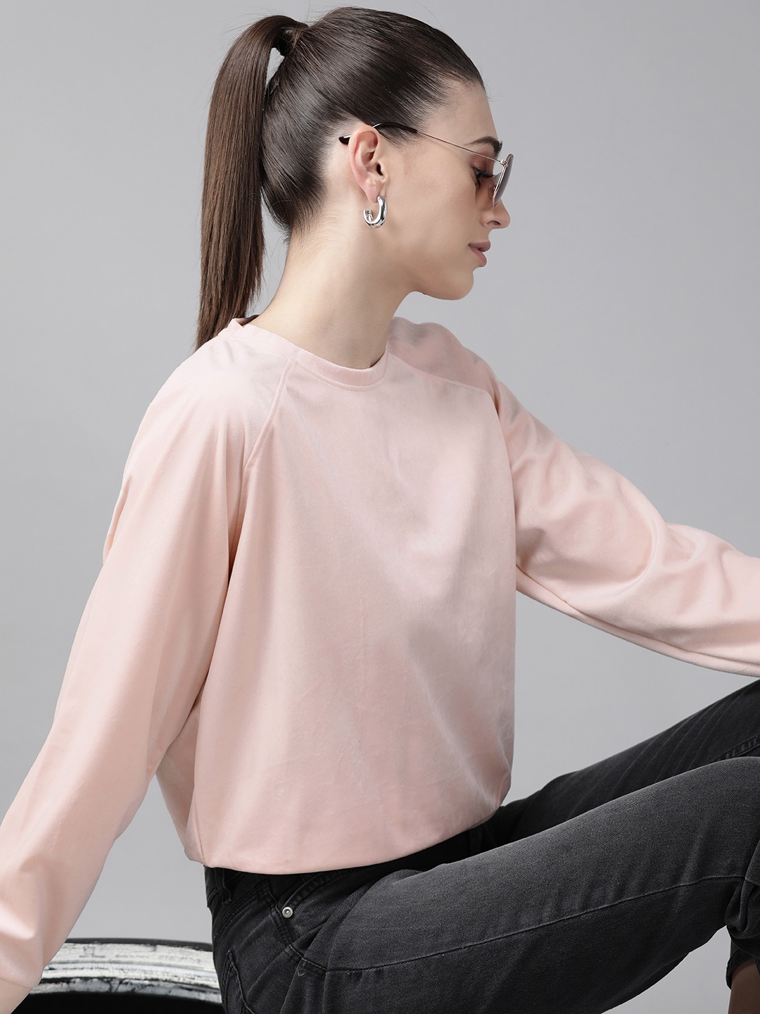 

Roadster Women Pink Solid Velvet finish Sweatshirt