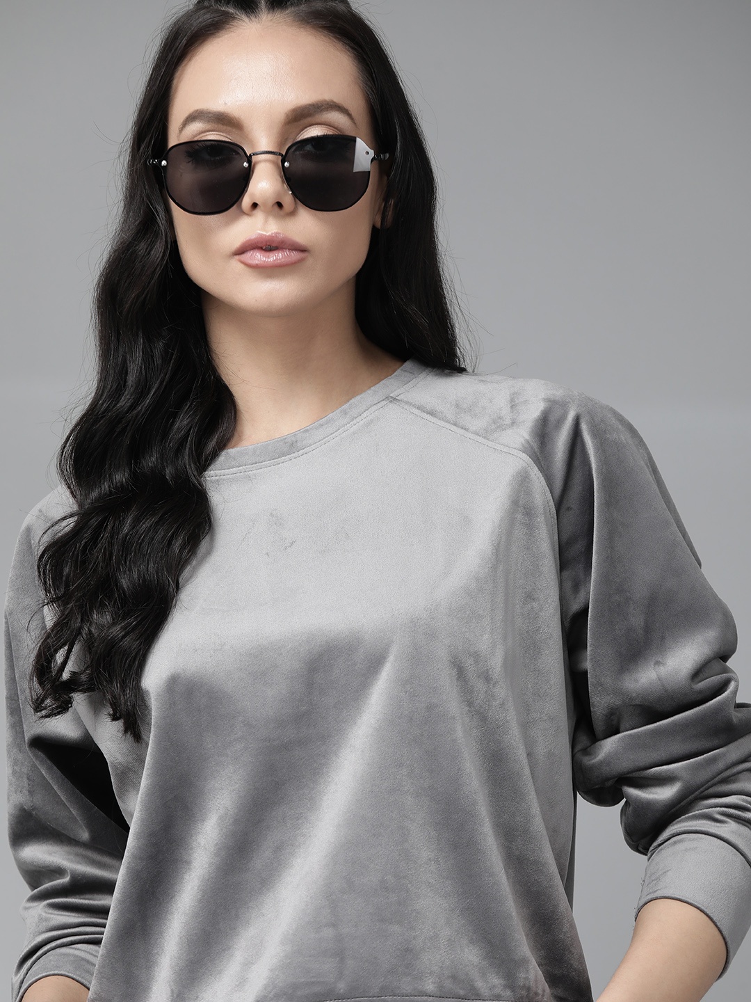 

Roadster Women Charcoal Grey Solid Velour Sweatshirt