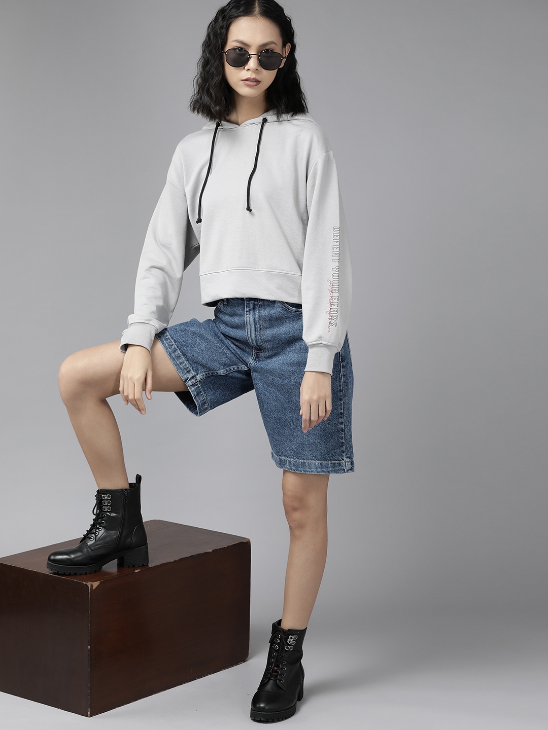 

Roadster Women Grey Solid Hooded Sweatshirt