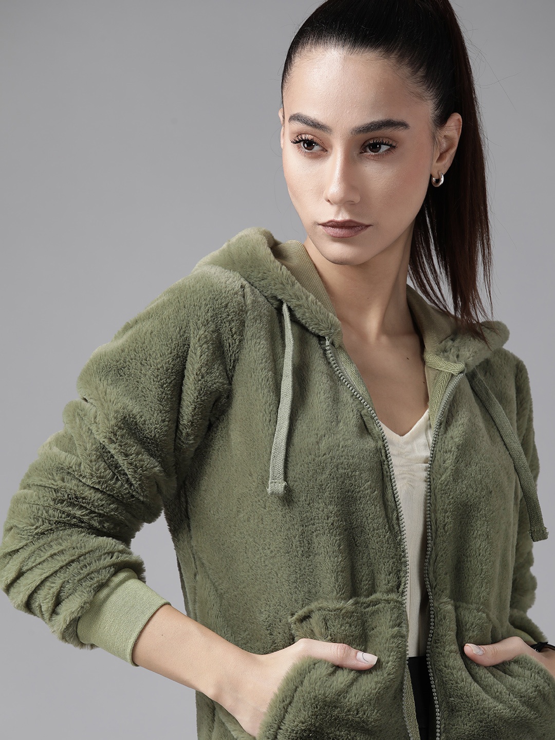 

Roadster Women Olive Green Solid Hooded Sweatshirt