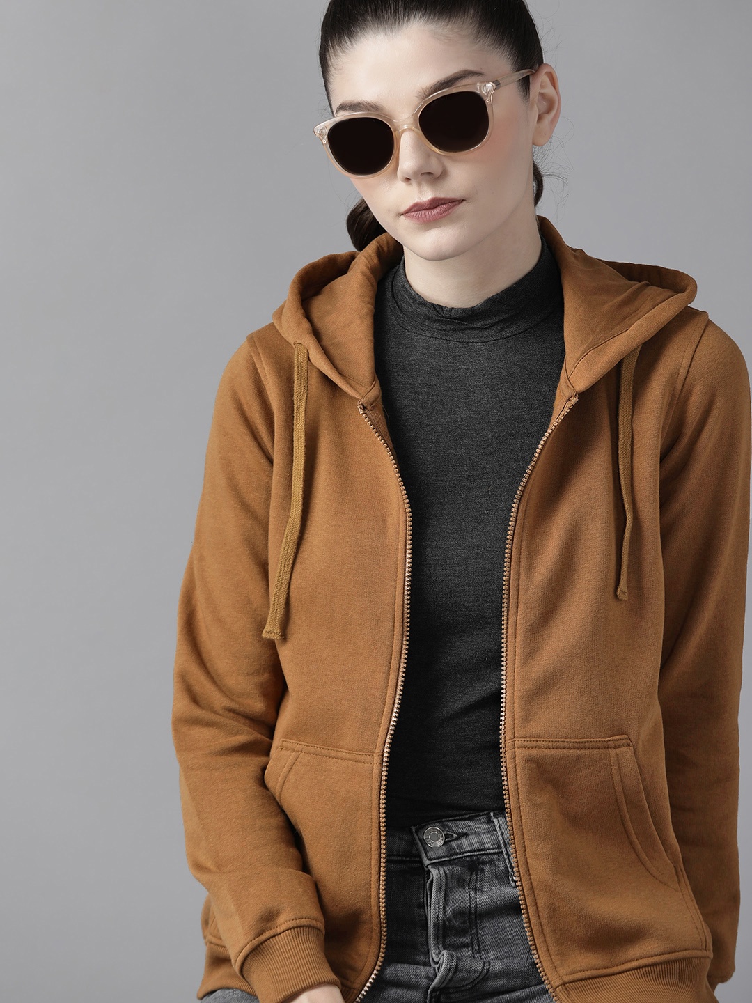

Roadster Women Khaki Solid Hooded Sweatshirt