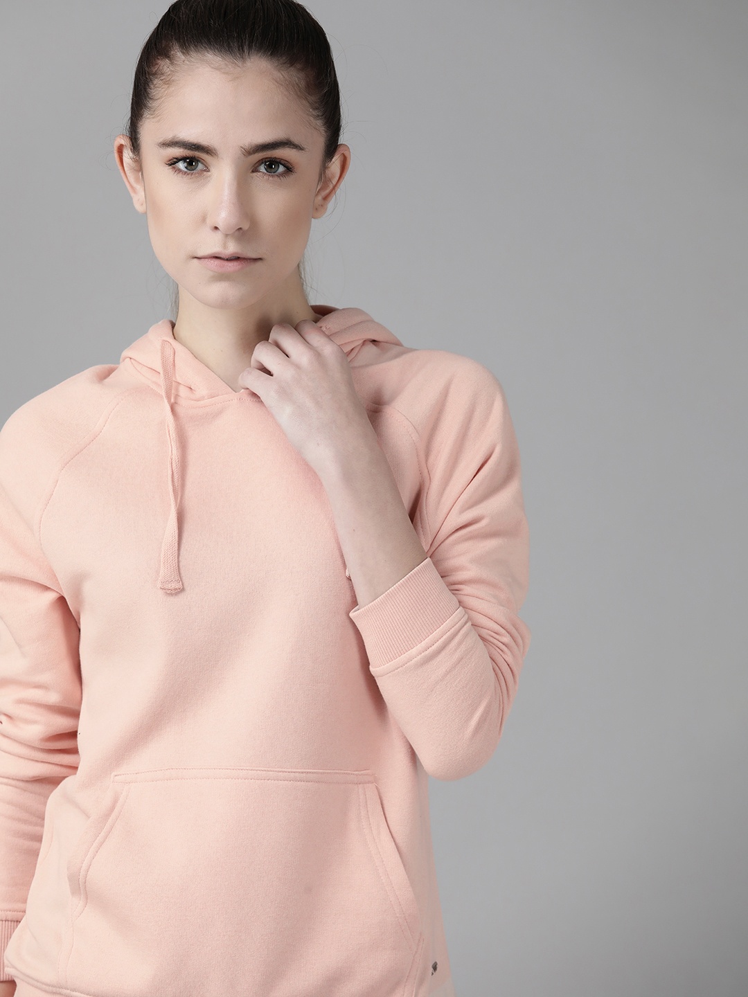 

Roadster Women Peach-Coloured Solid Hooded Sweatshirt