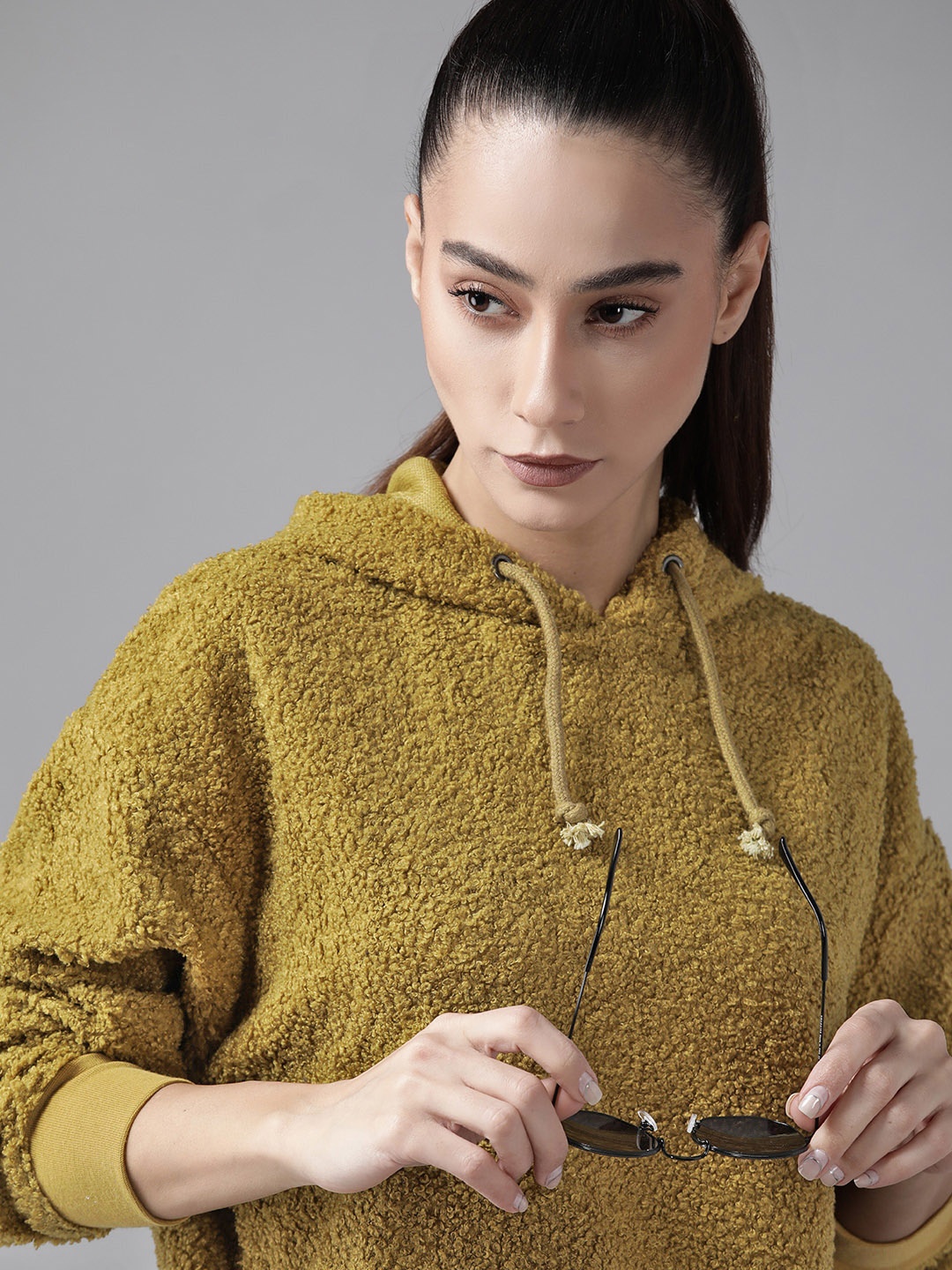 

Roadster Women Mustard Yellow Solid Sherpa Hooded Sweatshirt