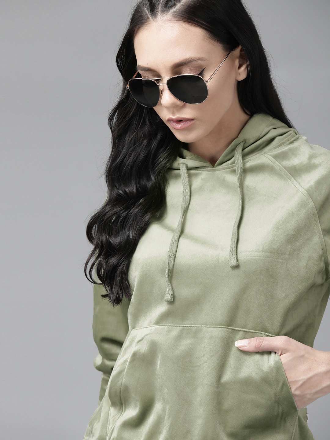 

Roadster Women Green Velvet Finish Solid Hooded Sweatshirt