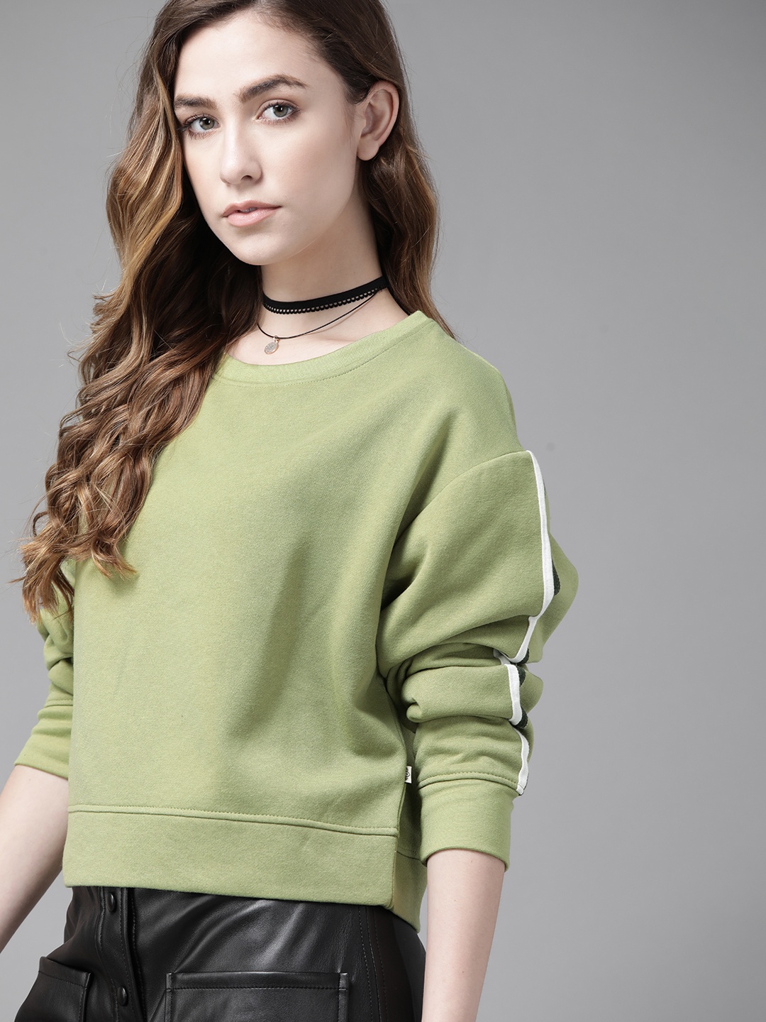 

Roadster Women Green Solid Sweatshirt