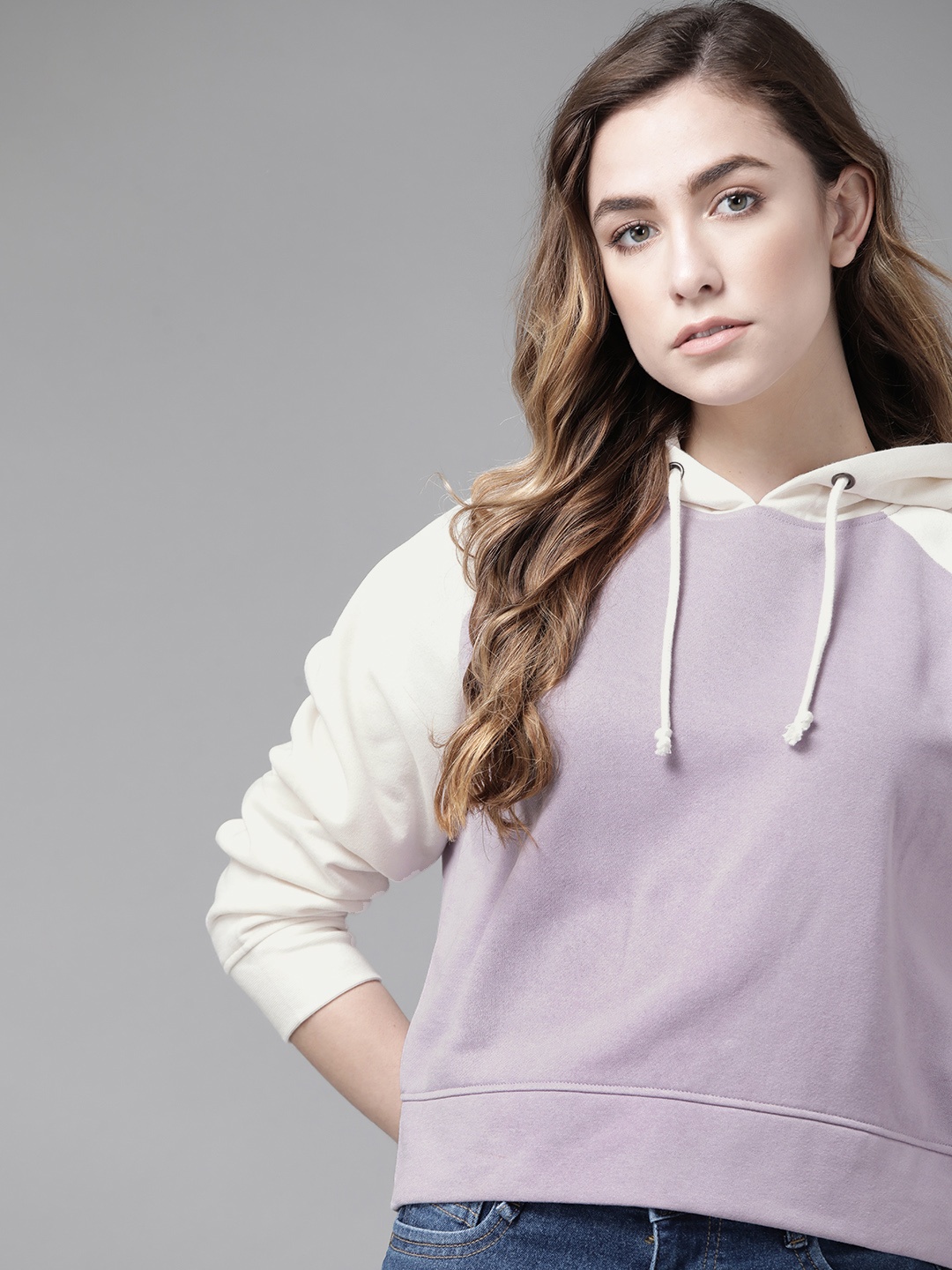 

Roadster Women Lavender & White Hooded Sweatshirt