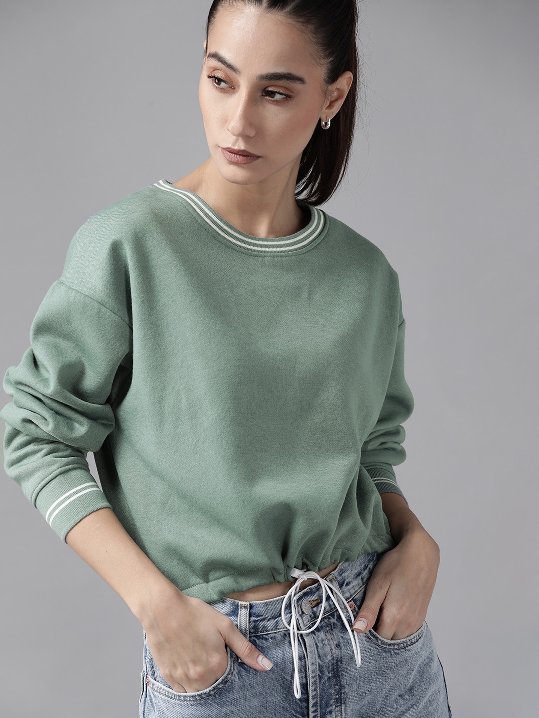 

Roadster Women Sea Green Solid Sweatshirt