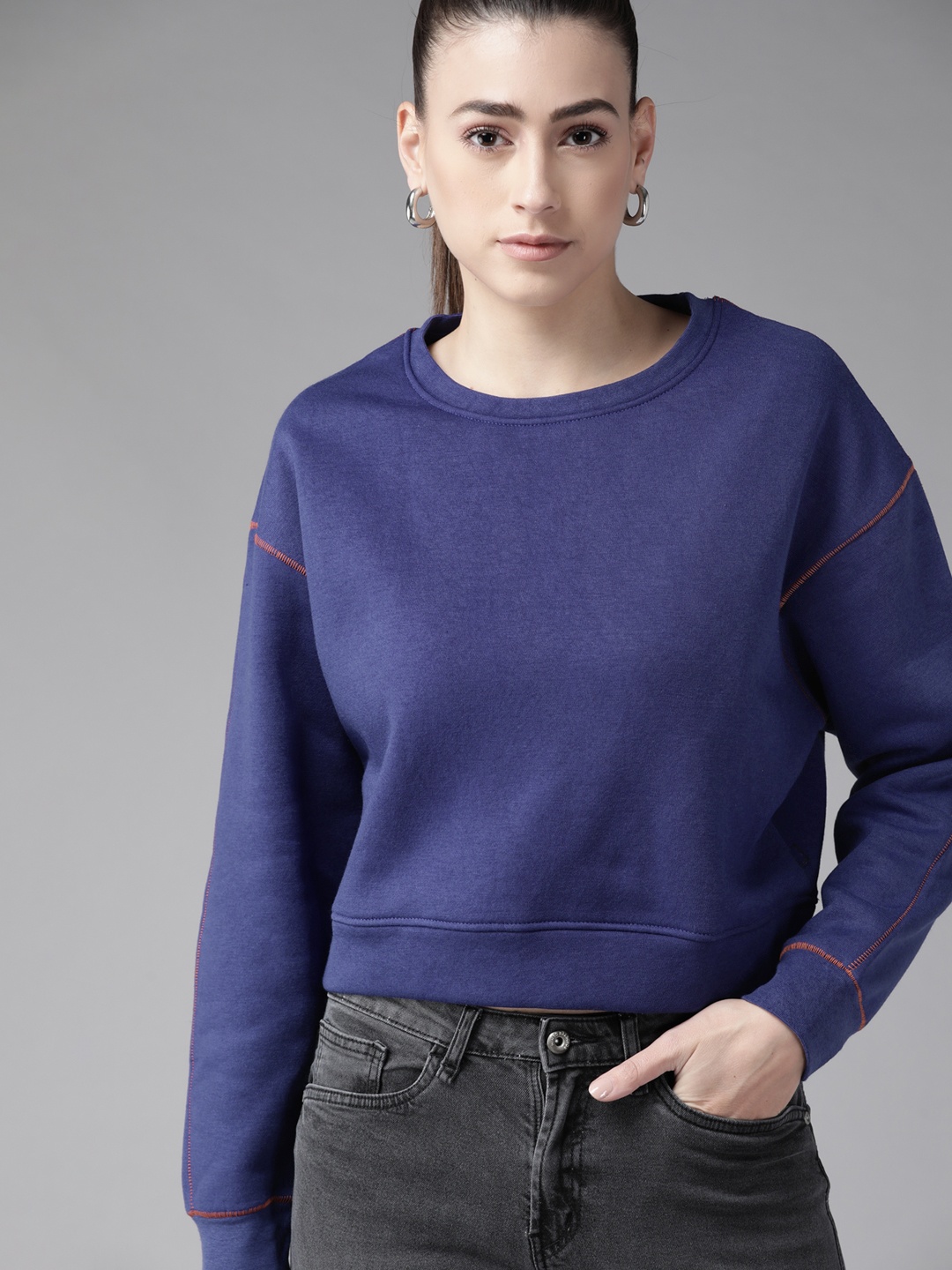 

Roadster Women Blue Solid Sweatshirt