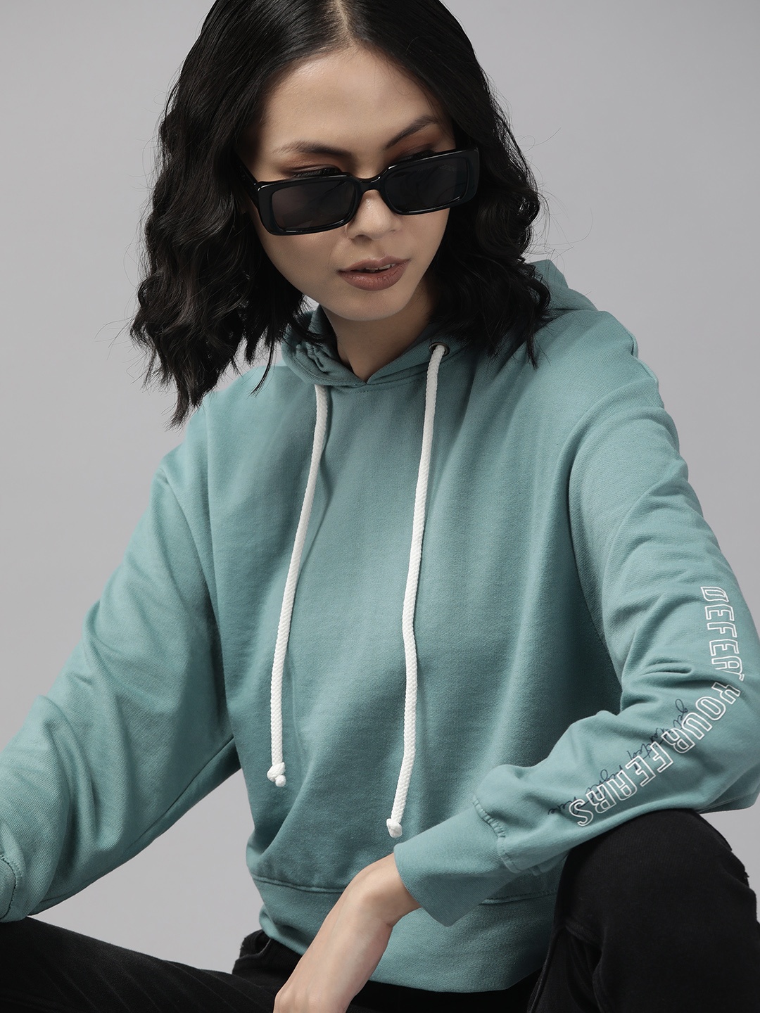 

The Roadster Lifestyle Co. Women Blue Hooded Drop Shoulder Sleeves Sweatshirt