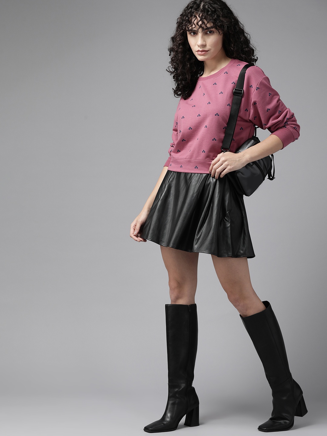 

The Roadster Lifestyle Co. Women Mauve Pink & Black Printed Sweatshirt