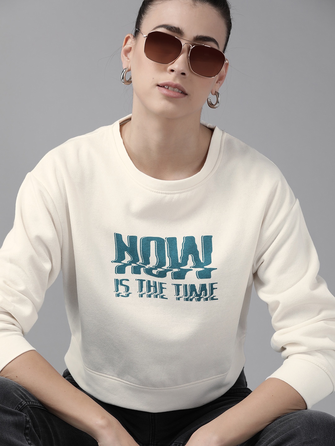 

Roadster Women Off White & Teal Typography Printed Sweatshirt