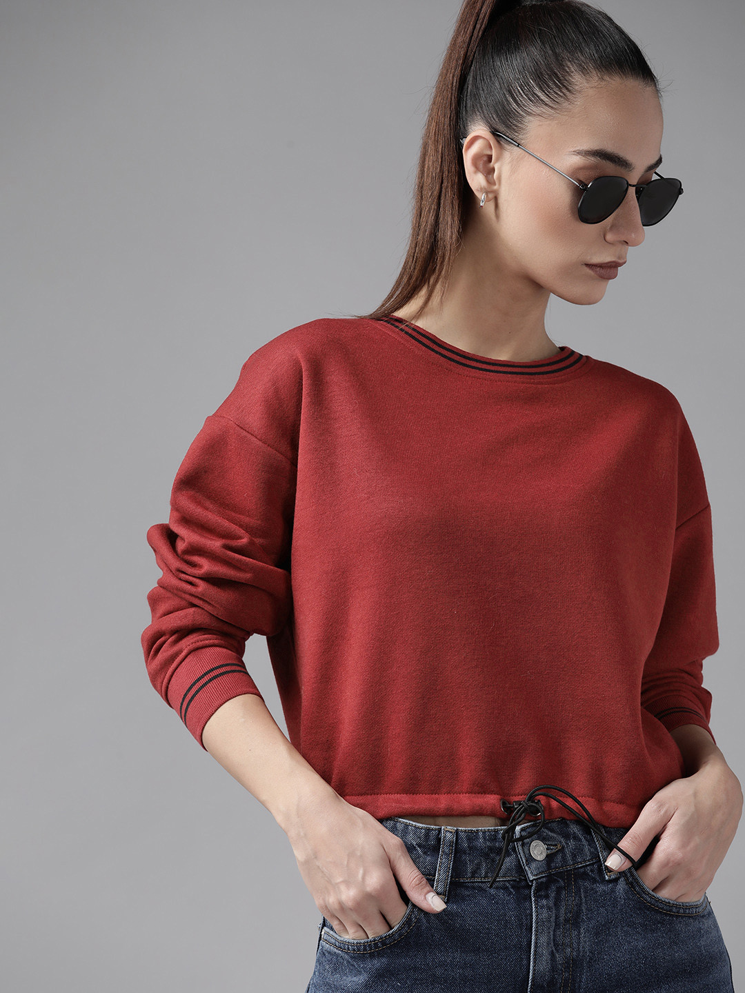 

Roadster Women Maroon Solid Sweatshirt
