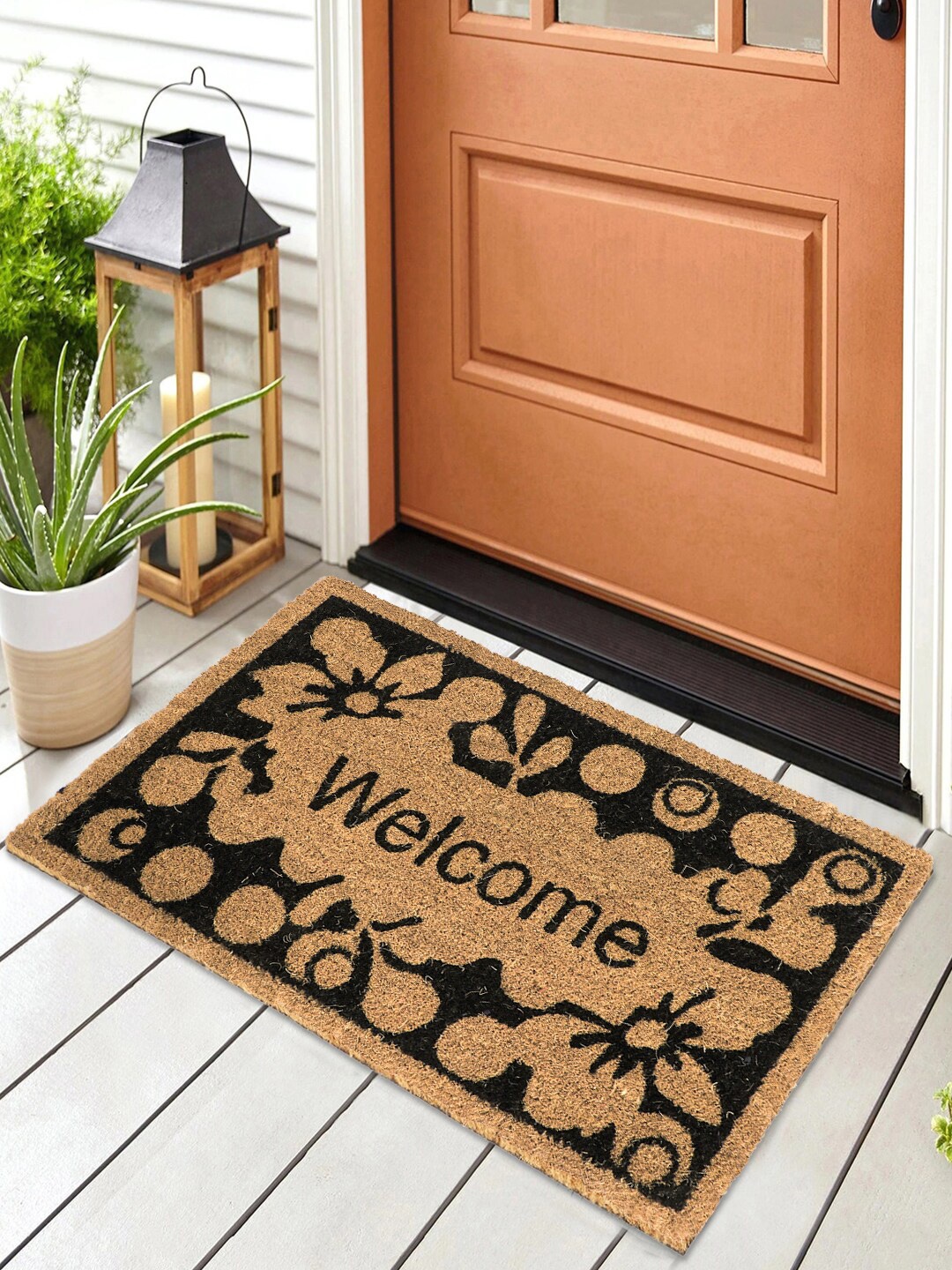 

HomeStorie Beige & Black Printed Anti-Skid Rectangular Doormat