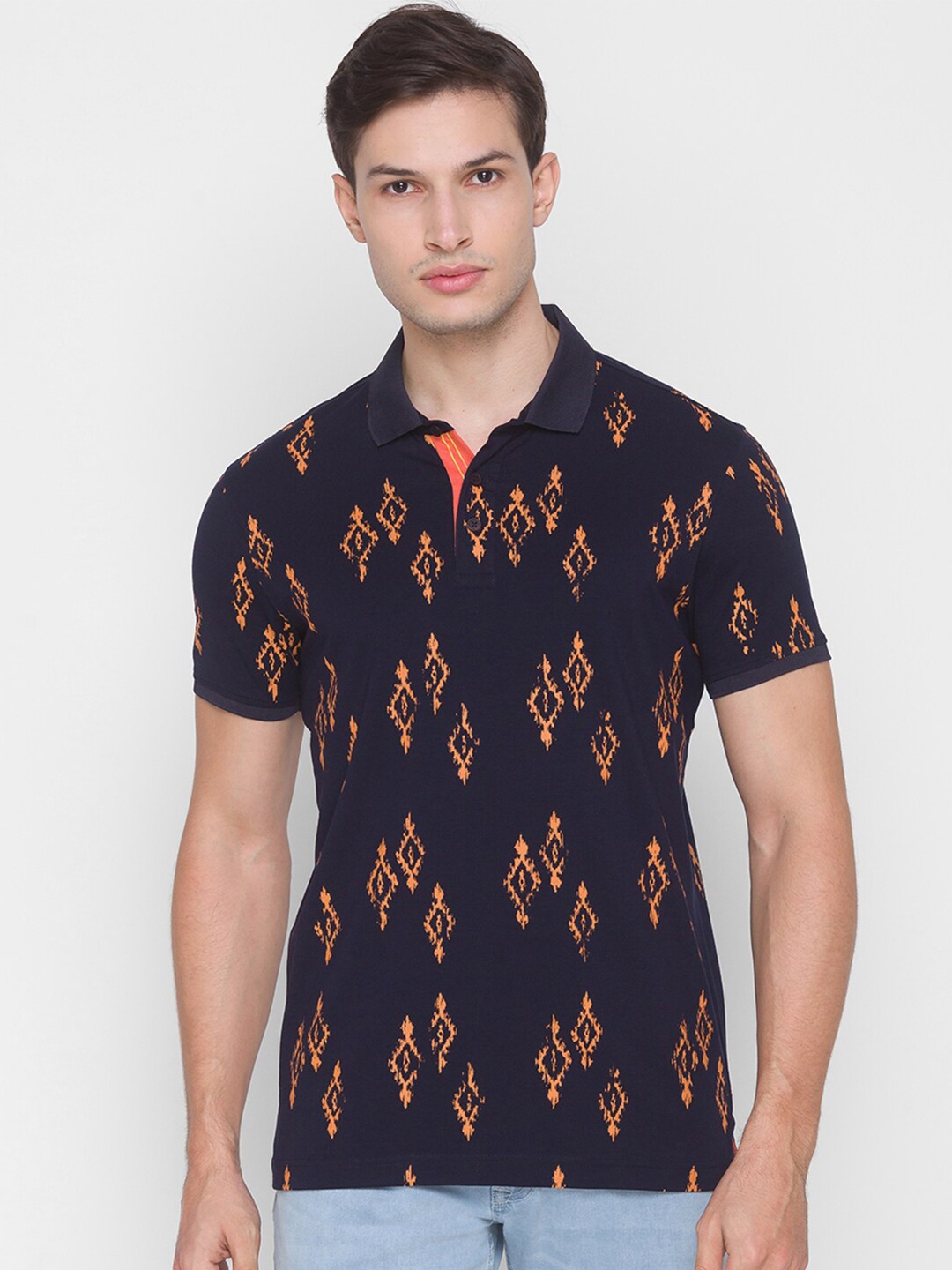 

SPYKAR Men Navy Blue & Orange Tribal Printed Polo Collar Slim Fit T-shirt