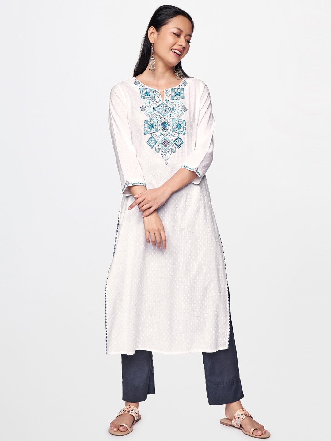 

Global Desi Women White Yoke Design Keyhole Neck Thread Work Kurta