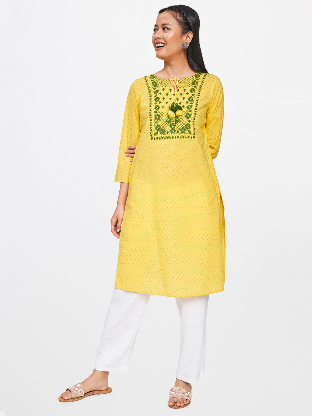 

Global Desi Women Yellow & Green Floral Yoke Design Thread Work Tie-Up Neck Kurta