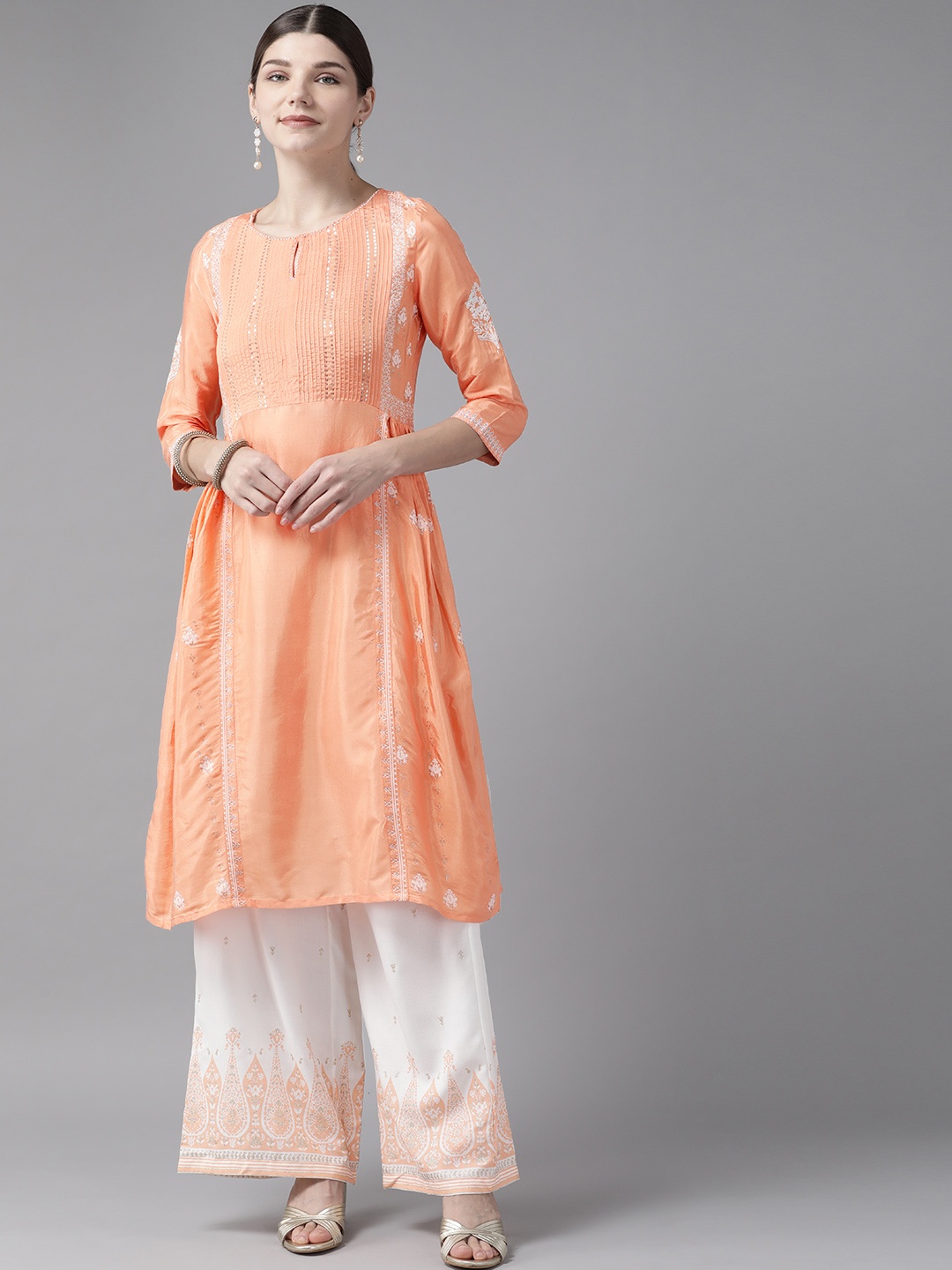 

W Women Orange & White Ethnic Motifs Panelled Sequinned Kurta with Palazzos