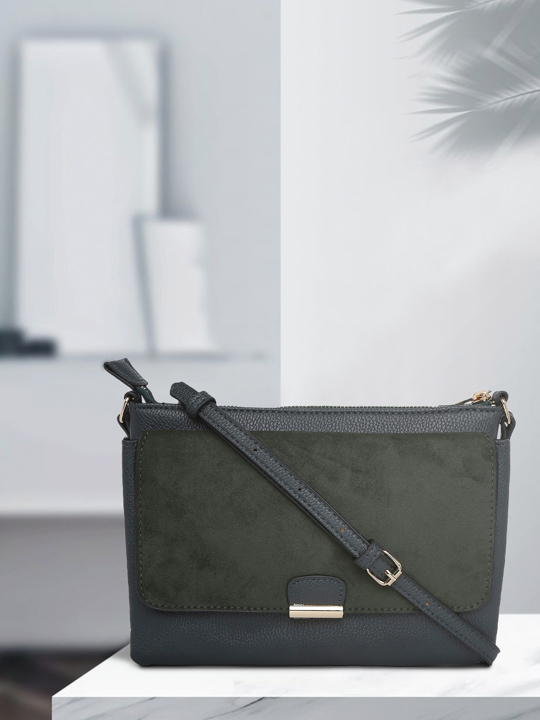 

Accessorize London Women Cassie Green Solid Sling Bag