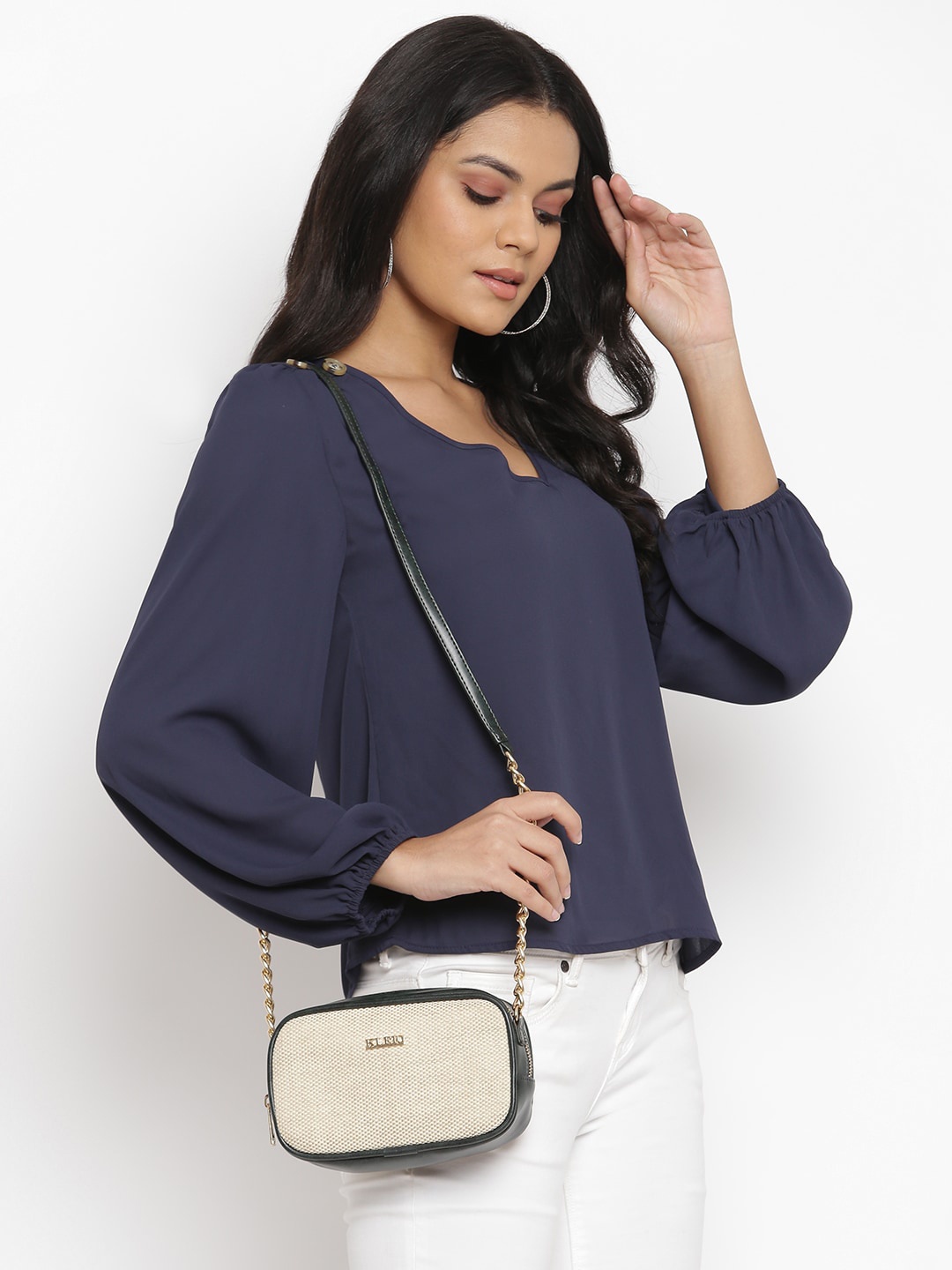

KLEIO Green Textured Structured Sling Bag with Tasselled