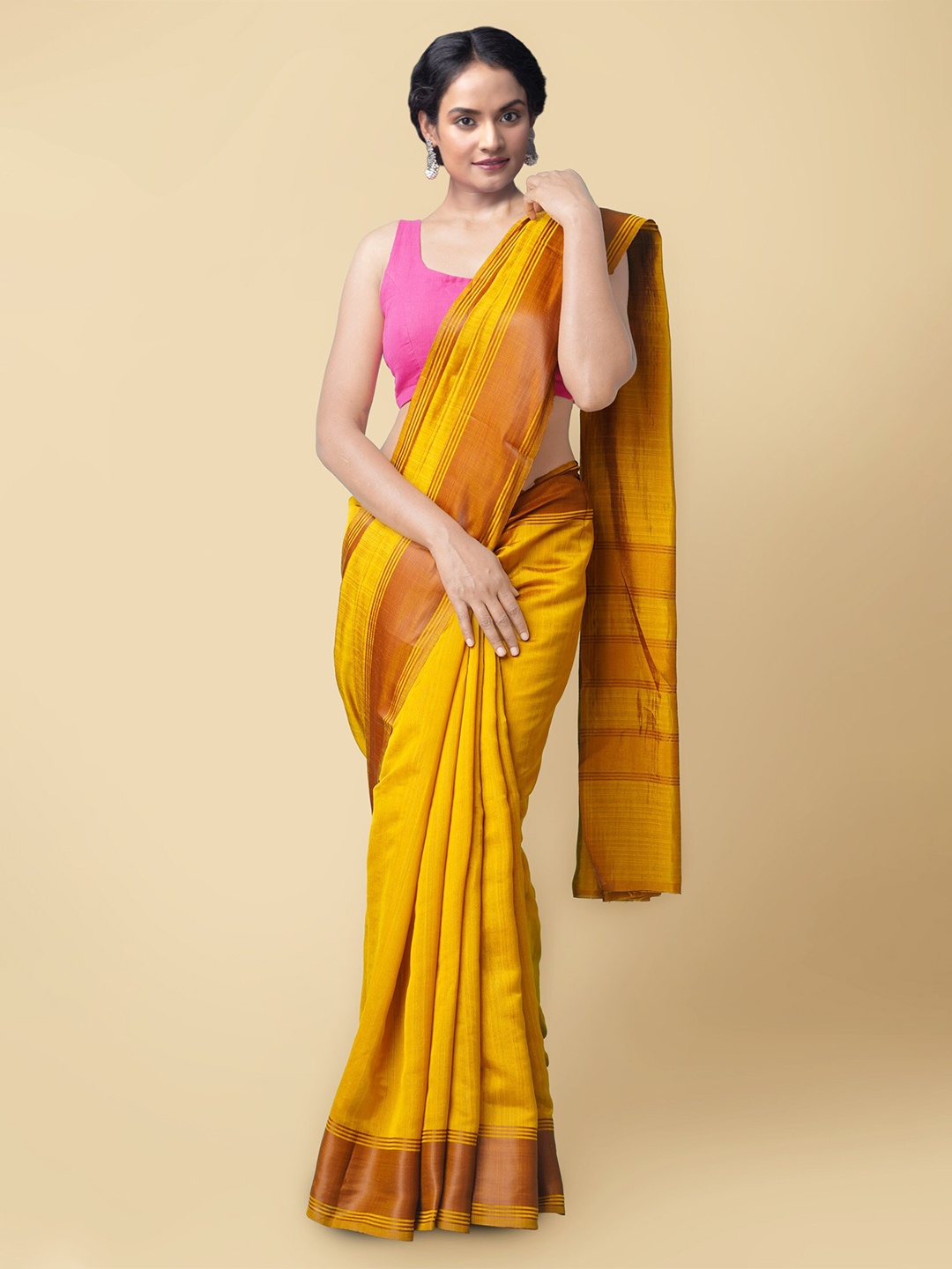 

Unnati Silks Women Yellow & Brown Fancy Art Silk Saree