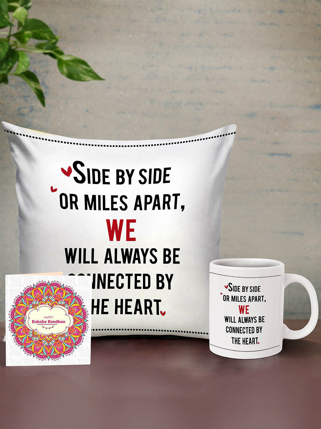 

TIED RIBBONS Muliticolored Cushion with Mug & Card Rakhi Return Gift Set for Sister, Multi