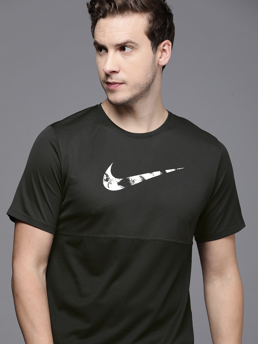 

Nike Men Black & White Brand Logo Printed Dri-FIT Run Wild Graphic Running T-shirt