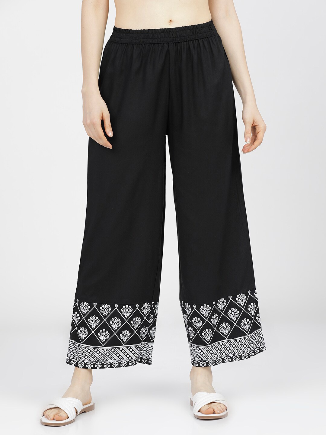 

Vishudh Women Black & White Ethnic Motifs Printed Ethnic Palazzos